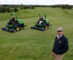 Denis Craggs with the two new John Deere 8000e hybrid fairway mowers cutting one of the greens at the 45 hole Knotty Hill Golf Centre in Co Durham.