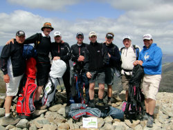 The PING Team on the summit of Scafell Pike: L to R: Pete Brown, Steve Carter, Dave Fanning, Phil Craghill, Tim Jenkins, James Turnbull, John Clark and Paul Jenkinson