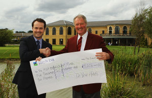 Jamie Carroll, De Vere Group Membership Sales Manager (left) presents cheque to PGA Captain Jim Farmer