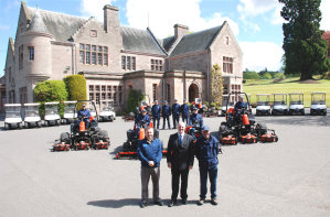 (l-r) Alan Reid, the resort’s head professional, general manager Mark Rawlings-Lloyd and course manager Darren Urqhart, at the handover of the turf maintenance fleet and golf cars