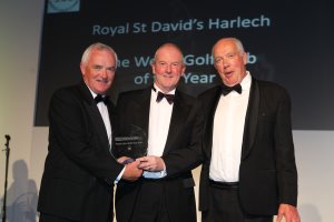 Harlech Secretary Trefor Davies and Captain Chris Kerin getting the award from Jim Smith