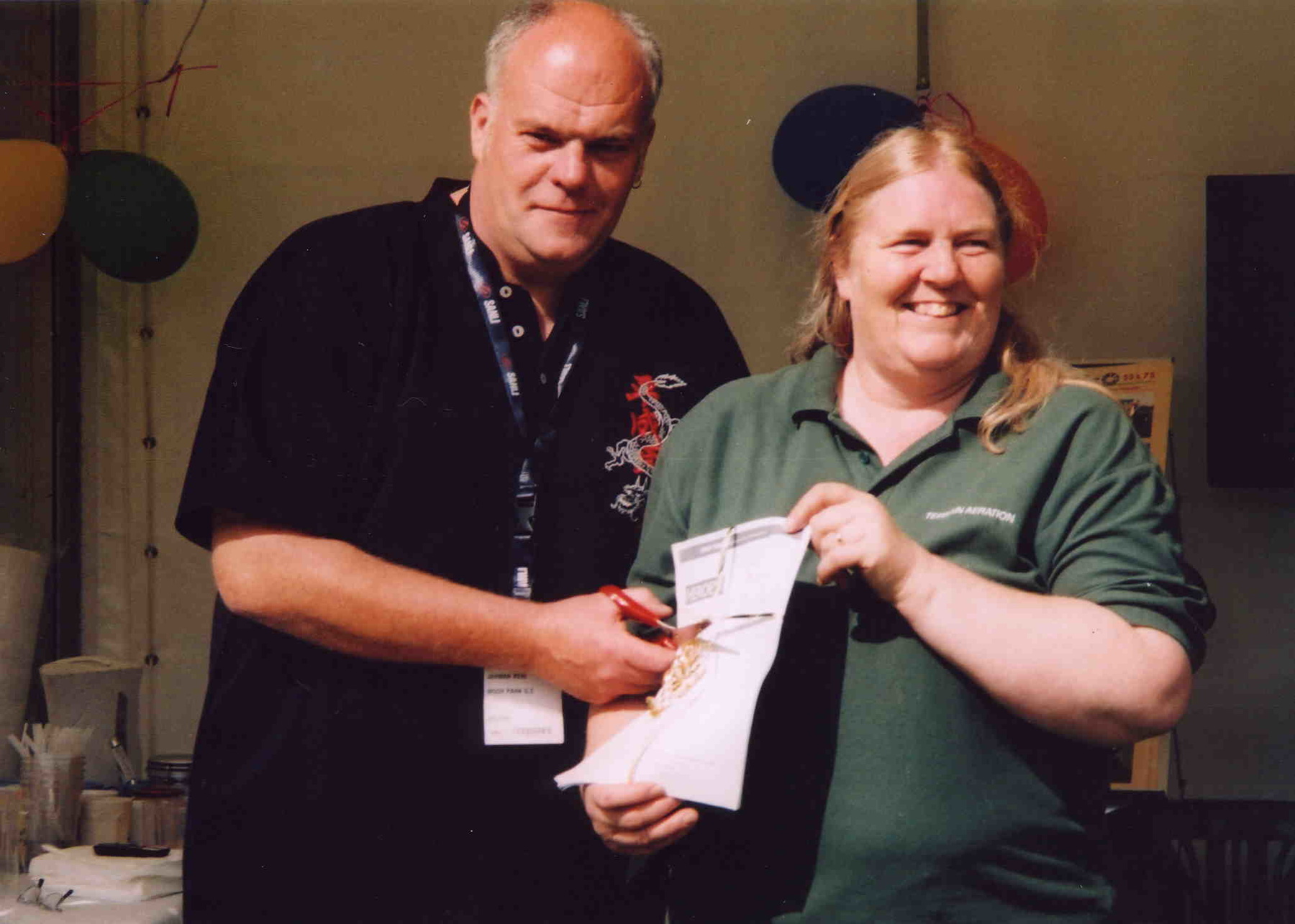 Keri Jarman cuts the ribbon on this year's nomination forms with Terrain Aeration's Lynda Green.