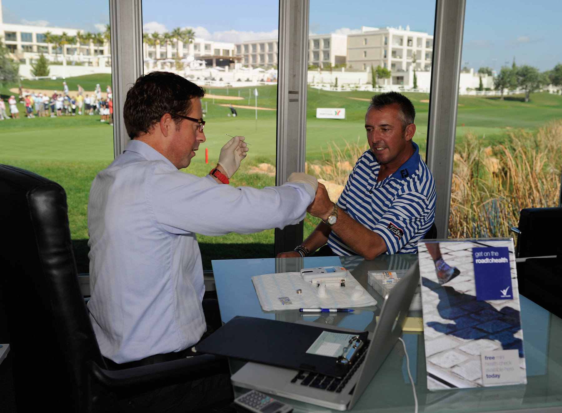 Caddie Phil Morbey gets tested for “Fit for Golf” during the Portugal Masters.