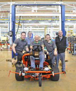 Team Leader Dom La Bella (seated) and his production engineers with the last  G-Plex III to roll of the Ransomes Jacobsen production line