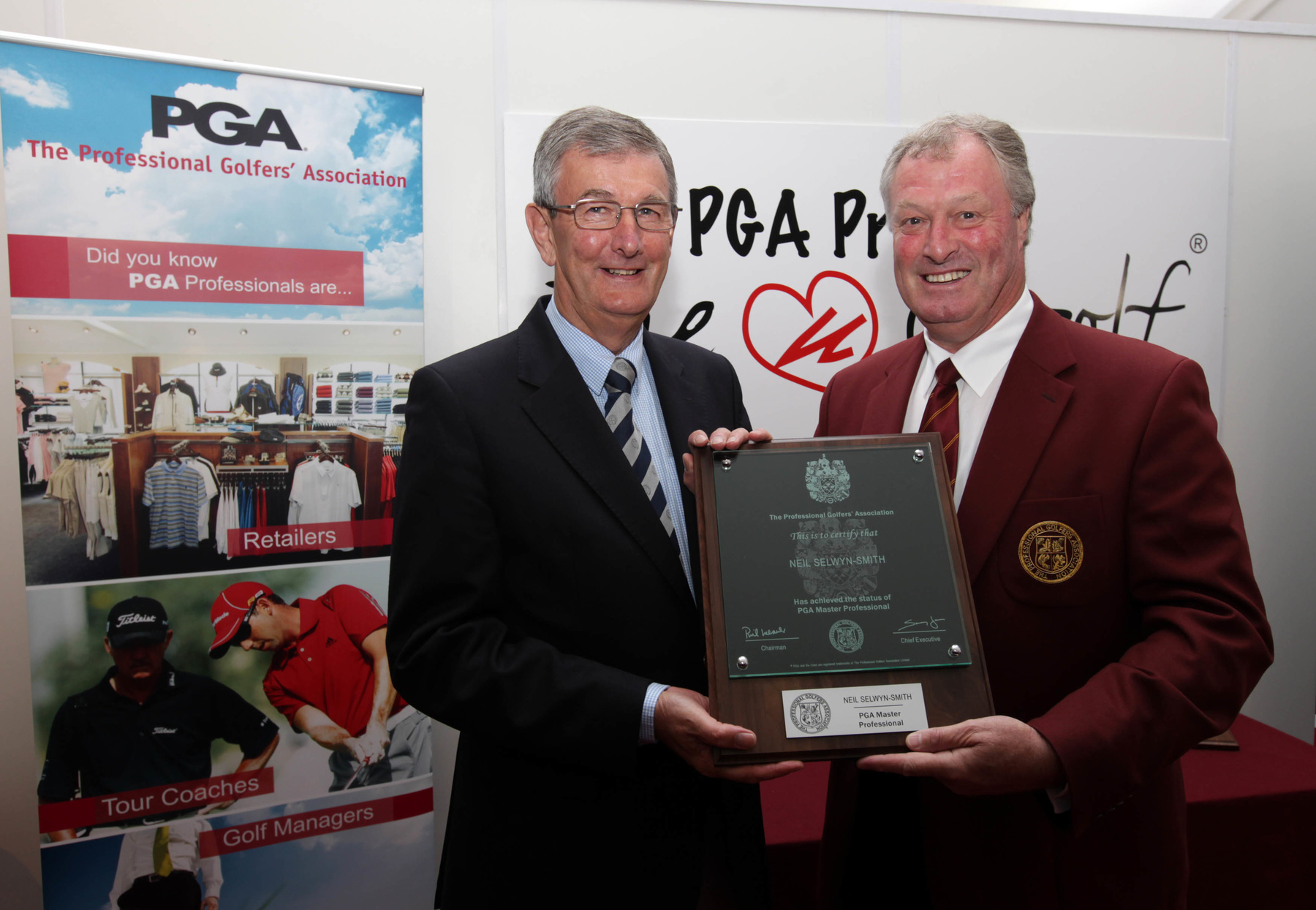 Neil Selwyn-Smith (left) receiving his PGA Master Professional award from current PGA Captain Jim Farmer