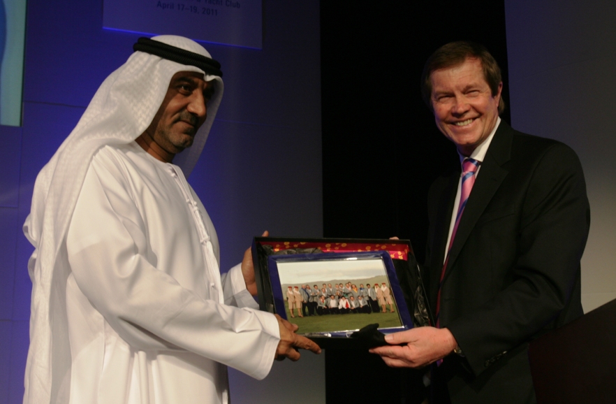 His Highness Shaikh Ahmed bin Saeed Al Maktoum, President of the Department of Civil Aviation, CEO and Chairman of The Emirates Group, receives a picture memento of last year’s winning European Ryder Cup team from George O’Grady, Chief Executive of The European Tour at the KPMG Golf Business Forum in Dubai 