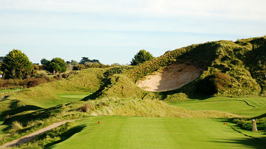 St Enodoc (Church course) 6th hole with Himalayas bunker in the foreground and green to the left