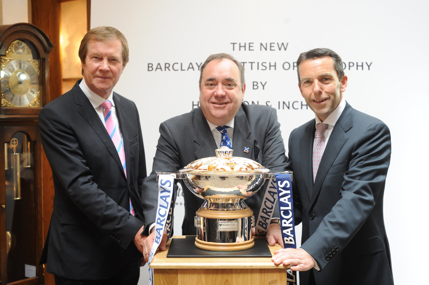 (l-r) George O’Grady, Chief Executive of The European Tour: Alex Salmond, Scotland’s First Minister; and Ian Stuart, Head of Barclays Corporate UK, unveil the new trophy for the 2011 Barclays Scottish Open at the Edinburgh offices of Hamilton & Inches, the trophy designers (Picture courtesy of Chris Watt).