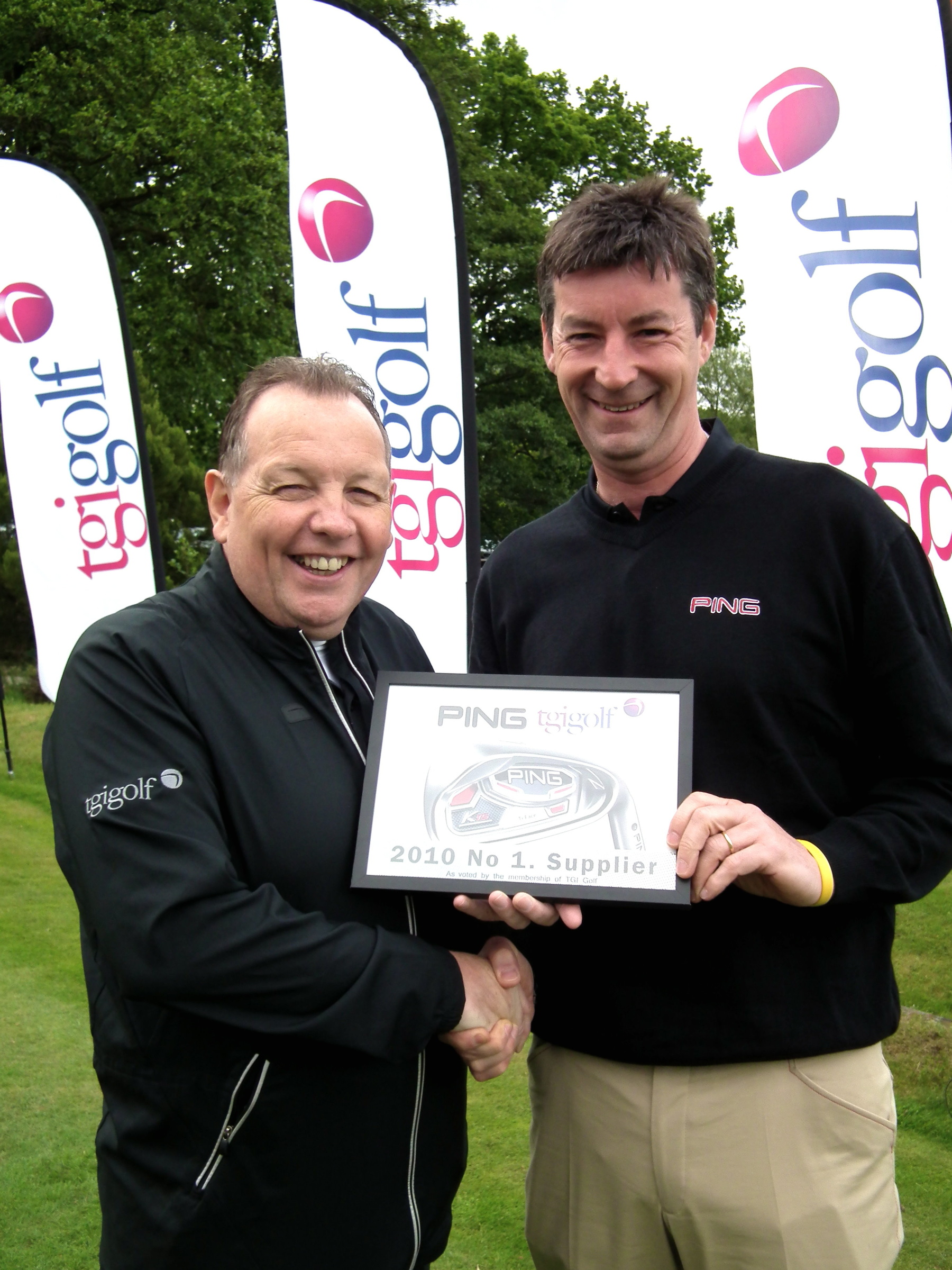 Eddie Reid, TGI Golf Managing Director (left), presents the number-one equipment supplier certificate to Steve Carter, PING UK Sales Manager.