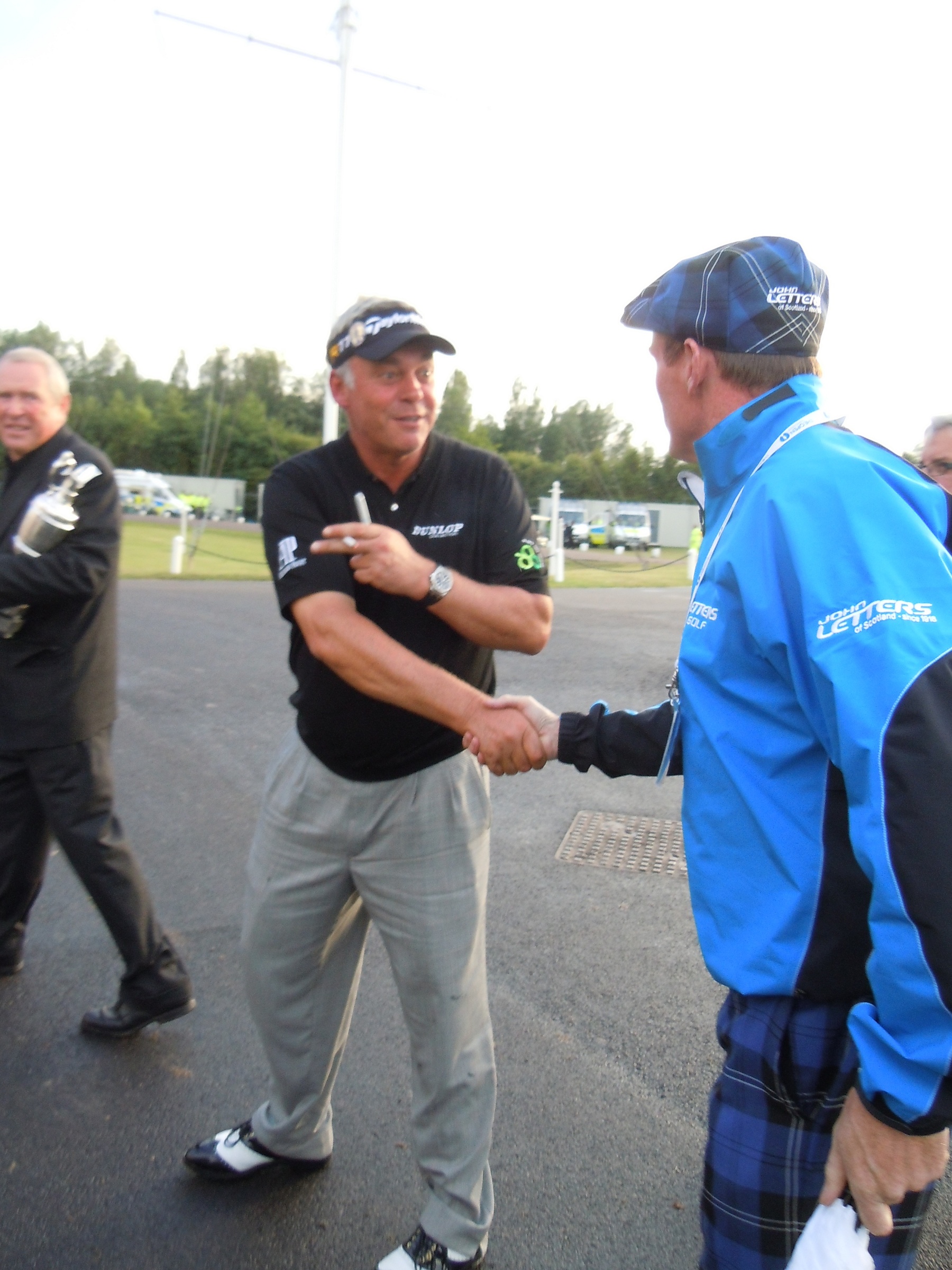 Darren Clarke is congratulated by John Andrew