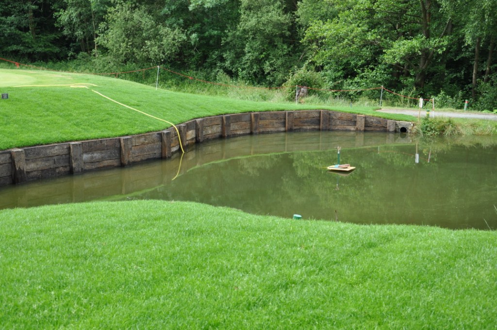 The enlarged pond at the third hole
