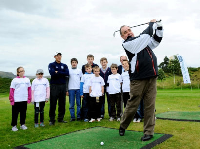 First Minister Alex Salmond announces clubgolf funding at Gleneagles with  young clubgolfers from Lauder GC.