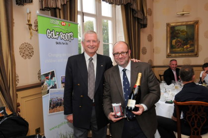 Golf Foundation Chairman Charles Harrison (left) presents Golf Monthly Editor Mike Harris with the prize for ‘nearest the flag’ at the testing 9th hole at Buckinghamshire GC