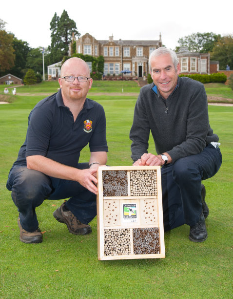 Presentation of a bee hotel to Steve Thompson from Rod Burke of Syngenta (right)
