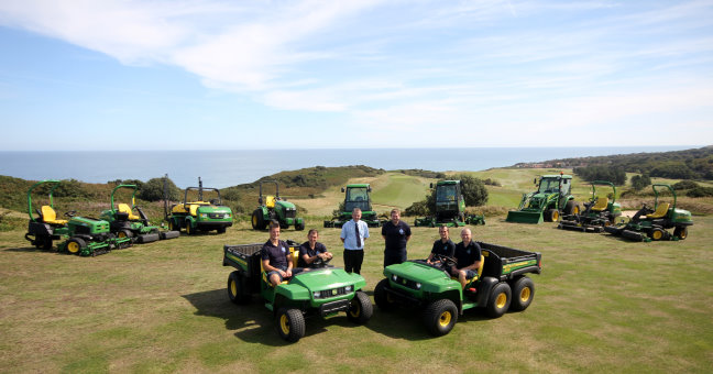 Royal Cromer Golf Club head greenkeeper Mark Heveran with dealer Stuart Edge of Ben Burgess (standing right and left) and (left to right) greenkeepers Oliver Denton, Laurence Wright, Matthew Green and Stuart Plummer, with the club’s new John Deere machinery fleet.