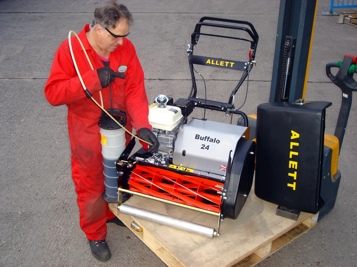 Oil is drained from the Buffalo engine’s sump before the mower is crated ready for flying out to India to appear in a BBC Top Gear Special first broadcast between Christmas and the New Year 2011