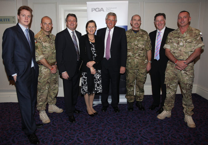From left: Raleigh Addington, (Tickets for Troops), Lt Col Allan Thomson (Royal Marines), PGA captain Eddie Bullock, Lady Caroline Richards, Colin Montgomerie, CSgt Gary Meekins (Parachute Regiment), Parnell Reilly and WO1 Locky O’ Loughlin (REME) (courtesy of Andy Redington at Getty Images)