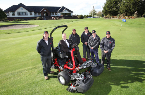 Elliston Millar, seated on Peterstone Lakes Golf Club’s new Toro TriFlex, surrounded by the greenkeeping team.