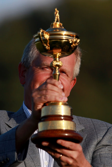 Colin Montgomerie hoisting the Ryder Cup trophy (courtesy of Getty Images)