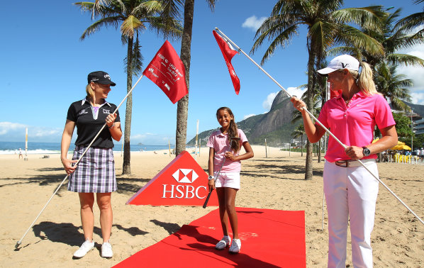 ‘Girls from Ipanema’: Golf's Past, Present and Future: Women's golf legend Annika Sorenstam (left) and World No3 Suzann Pettersen (right) celebrate the start of the LPGA Brasil Cup presented by HSBC with 13-year-old Rio golfer Vitoria Monteiro on Ipanema Beach, Rio de Janeiro (photo HSBC/Getty Images)