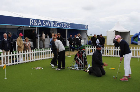 Fans receive expert tuition on the Huxley Golf putting green at last year’s Open Championship © Huxley Golf