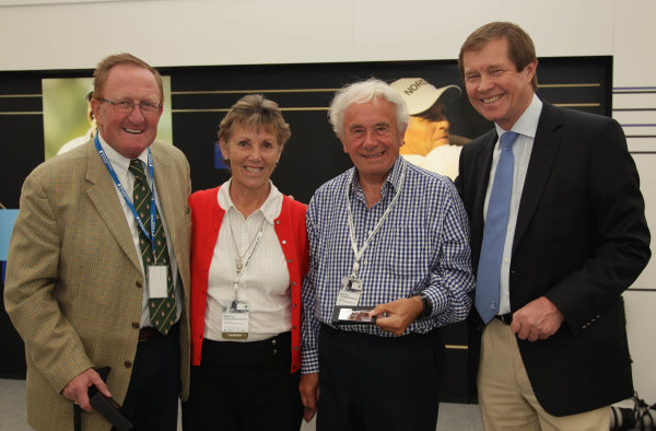 Brian Huggett (centre)pictured with his wife Winnie in receiving Honorary life membership of the European Tour in 2012
