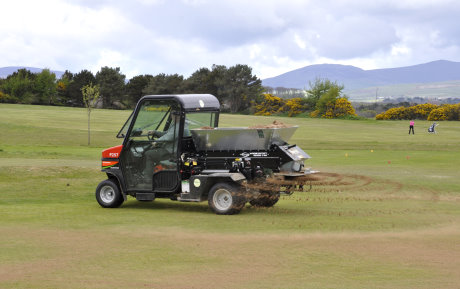 The new Cushman Turf-Truckster and Turfco WideSpin in action at Douglas Golf Club
