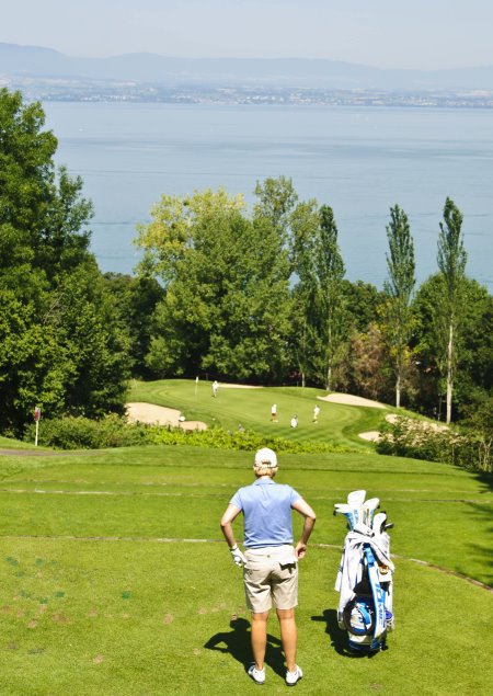 The 12th hole at Evian Royal Resort, overlookingLake Geneva, being played during the Evian Masters