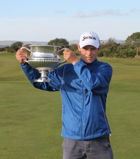 Oly Browning from Stocks Golf Club with the BIGGA Trophy