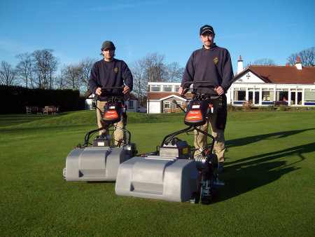 Greens staff Neil Barrett and Dean Ward with the Jacobsen Eclipse2 battery-powered greens mowers