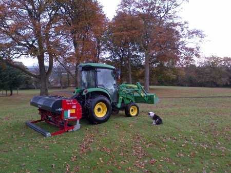 Course Manager, Allan Golding’s trusty assistant Meg the dog with his Charterhouse Verti-Drain 2220