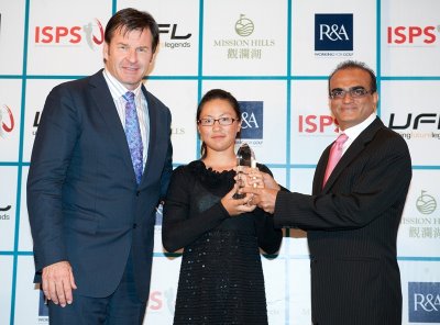 Ji Rong of Kunming,China with Sir Nick Faldo (left) and Ashok Mahtani (right) of UFL during the Faldo Series Asia Grand Final at Mission Hills Golf Club in March 2012.
