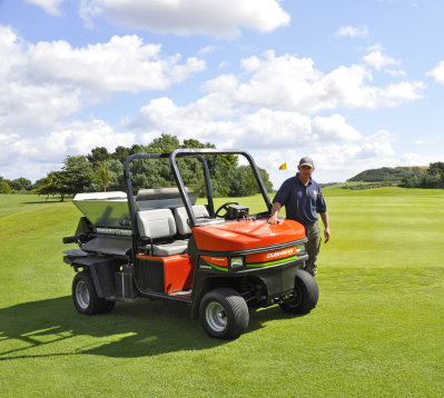 Vic Southwart mowing one of the tees