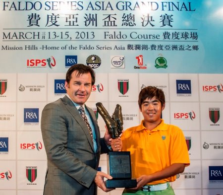 Sir Nick Faldo presents the Faldo Series Asia trophy to Luo Xue-Wen of China at Mission Hills Golf Club in Shenzhen in March 2013
