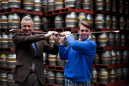 Paul Clouting, general manager Thorpeness Hotel and Golf Club, swings right handed and Christopher Oldrey, PGA Professional at Thorpeness Hotel and Golf Club swings left handed at Adnam’s Brewery to launch the Suffolk Ale and Golf Trail