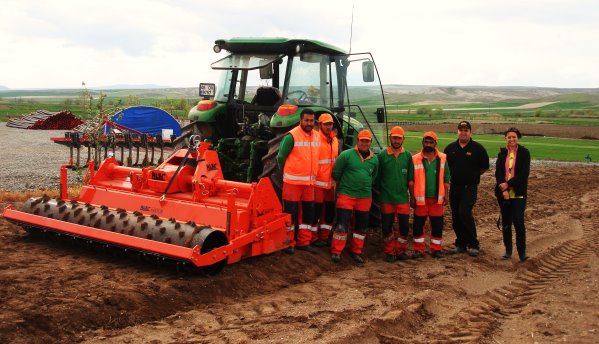 BLEC's Tom Shinkins with the Blecavator and FBK staff at their turf farm near Ankara, Turkey