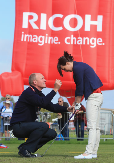 John Heggarty coaching Olympic gymnast Beth Tweddle (courtesy of Dave Cannon at Getty Images)