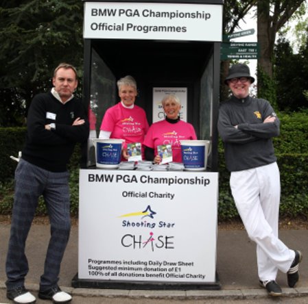 Actor Philip Glenister and Radio 2 DJ Chris Evans help with programme sales at the BMW PGA Championship