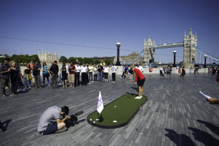 Charley Hull of England tries blindfolded putting