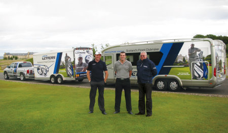 John Letters Tour trucks and John Andrew (left).