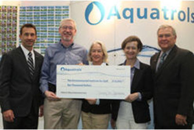 (from left) Rhett Evans, GCSAA CEO; Andy Moore, Aquatrols director of sales; Demie Moore, Aquatrols corporate relations; Tracy Jarman, president/CEO of Aquatrols; and Sandy Queen, CGCS, GCSAA immediate past president