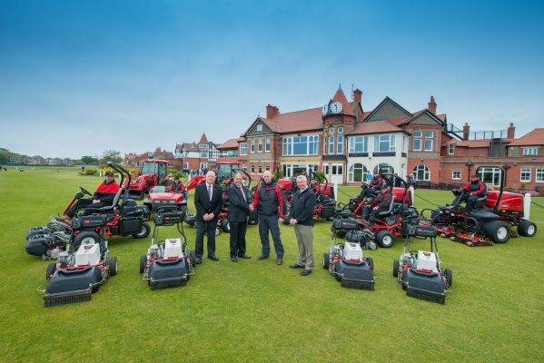 Centre, from left, are Lely’s Nigel Lovatt and Jeff Anguige, Craig Gilholm, and Cheshire Turf Machinery’s Steve Halley