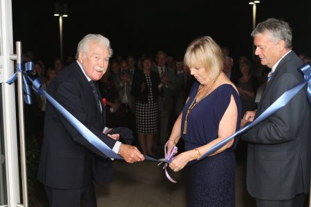 Ribbon cutting with Dickie Davies, Jennifer and Paul Gibbons