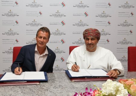 Mark Kirk, General Manager of Shangri-La Barr al Jissah Resort and HasanShaban, a Deputy General Manager at the National Bank of Oman, at the signing ceremony for the Premium Sponsor for the National Bank of Oman Golf Classic