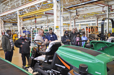 Richard Comely of Ransomes Jacobsen with the Sri Lankan delegation during their tour of the manufacturing facilities