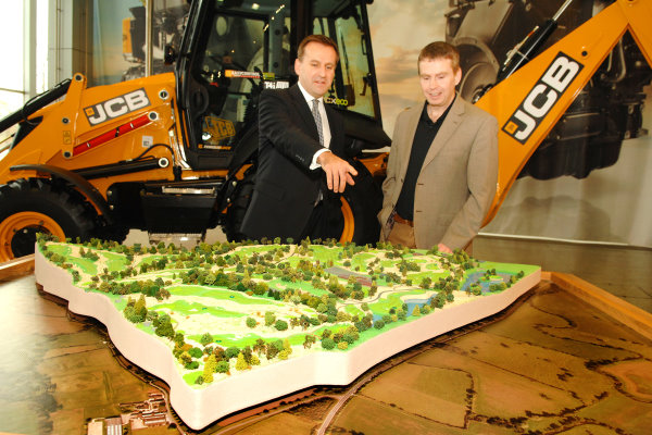 JCB CEO Graeme Macdonald (left) surveys a model of the new JCB Golf course with course architect, Robin Hiseman of European Golf Design