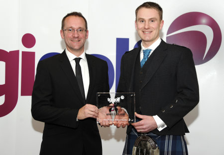 TGI Golf Partner of the Year 2013 Andy Carlton (right) is presented with his award by Senior Retail Consultant Ian Martin (left)