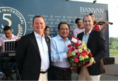 Banyan Golf Club general manager Stacey Walton and director of operations Stuart Daley make a presentation to TAT governor Khun Tawatchai Arunyik during the club's 5th anniversary celebrations