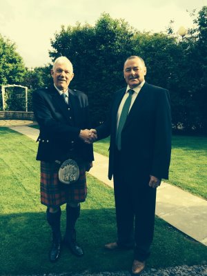 Ewen Wilson (right), sales manager at Dennis and SISIS thanks Alan Ronaldson (left) for twelve years’ service at the company before retiring