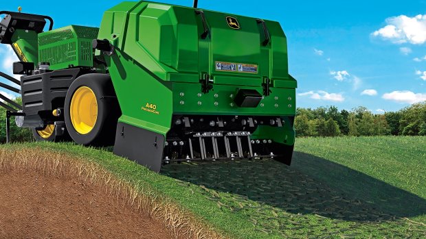 John Deere PrecisionCore aerator; a patented articulating frame delivers more consistent hole depth on undulating terrain,